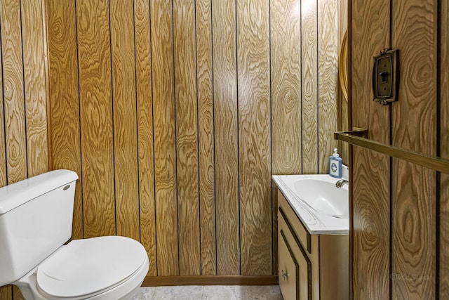 bathroom with toilet and vanity