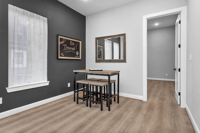 dining room featuring light hardwood / wood-style flooring