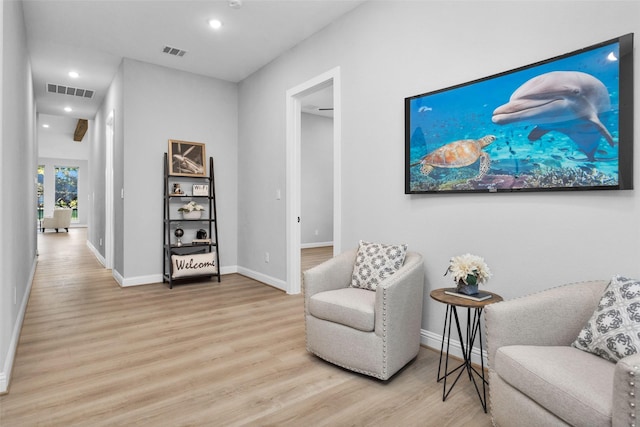 living area featuring light hardwood / wood-style flooring