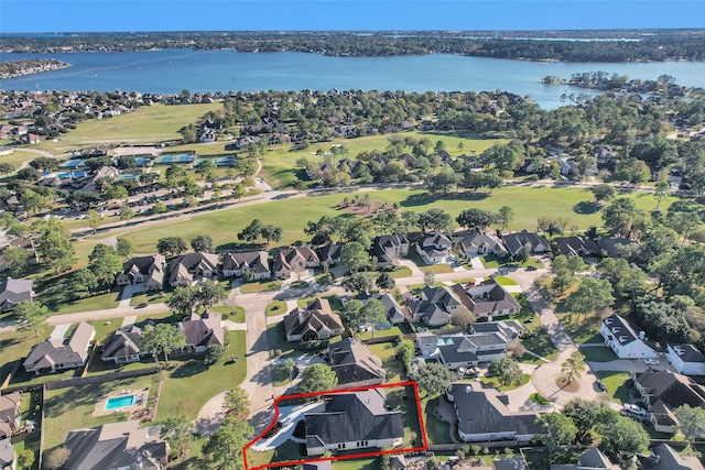 birds eye view of property featuring a water view