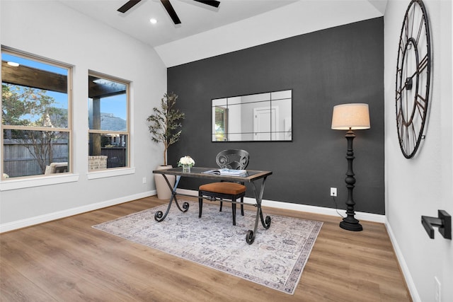 office featuring ceiling fan, lofted ceiling, and wood-type flooring