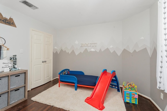 game room featuring dark hardwood / wood-style flooring