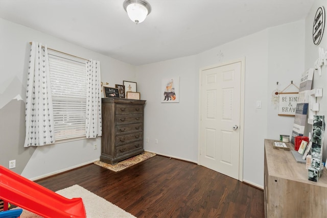 interior space with dark hardwood / wood-style flooring