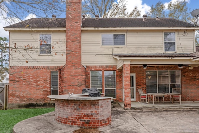 back of house with a patio, an outdoor bar, and ceiling fan