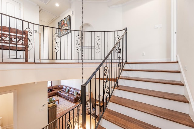 stairway with crown molding