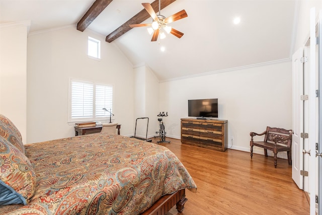 bedroom with ceiling fan, light hardwood / wood-style floors, multiple windows, and beamed ceiling