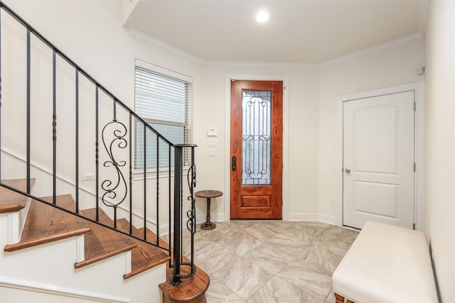 entryway with crown molding