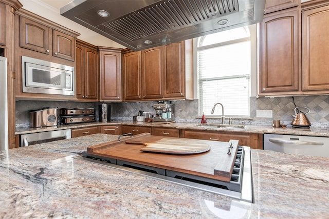 kitchen featuring extractor fan, sink, backsplash, stainless steel appliances, and wine cooler