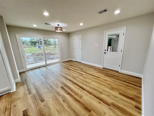 empty room featuring light hardwood / wood-style flooring