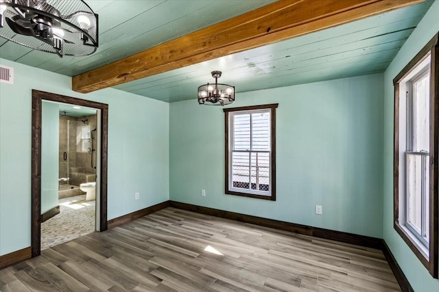 unfurnished dining area with wood ceiling, a chandelier, beam ceiling, and hardwood / wood-style floors