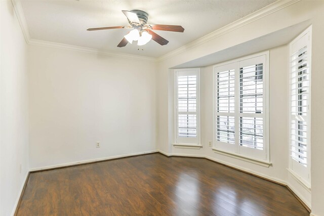 empty room with ceiling fan, crown molding, and dark hardwood / wood-style floors