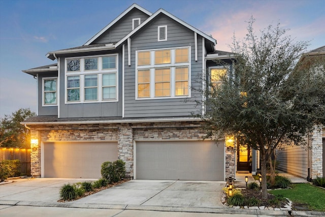 view of front of property with a garage