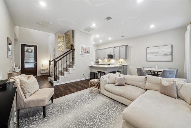 living room featuring dark hardwood / wood-style floors