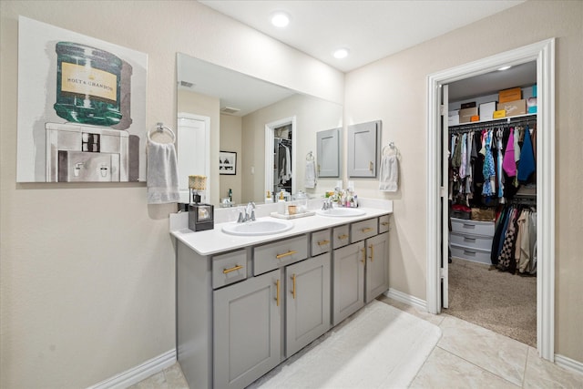 bathroom featuring tile patterned floors and vanity