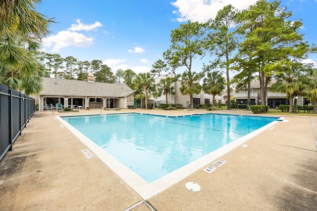 view of pool featuring a patio