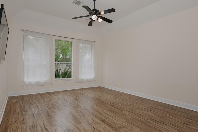 empty room featuring ceiling fan and light wood-type flooring