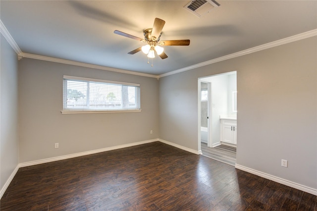 spare room featuring crown molding, ceiling fan, and dark hardwood / wood-style flooring