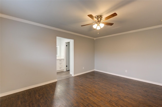 spare room with ceiling fan, dark wood-type flooring, and ornamental molding