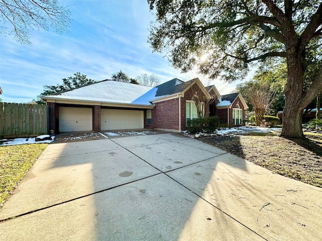 ranch-style home with a garage