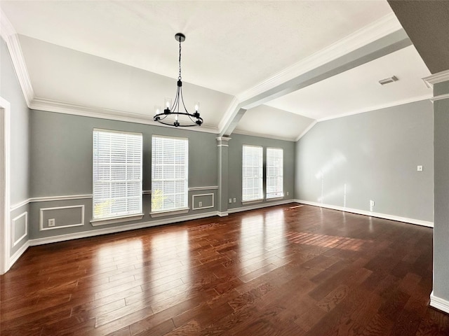 spare room with ornate columns, crown molding, a chandelier, and dark wood-style flooring