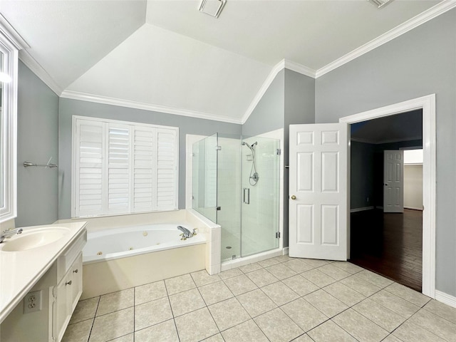 full bath featuring ornamental molding, tile patterned flooring, visible vents, and a whirlpool tub