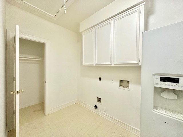 washroom with hookup for an electric dryer, hookup for a gas dryer, washer hookup, water heater, and cabinet space