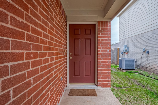 entrance to property with central AC unit