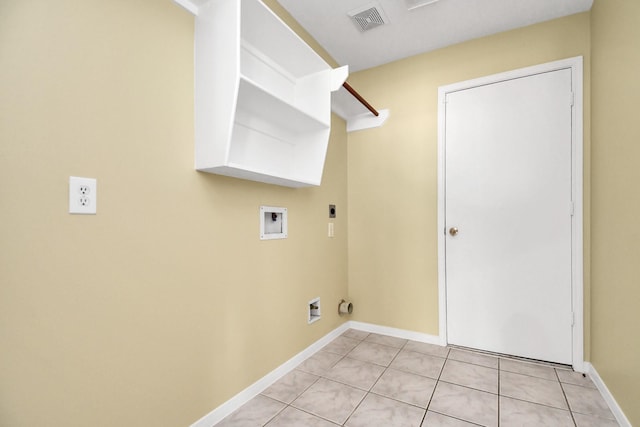 washroom with hookup for a washing machine, electric dryer hookup, and light tile patterned floors