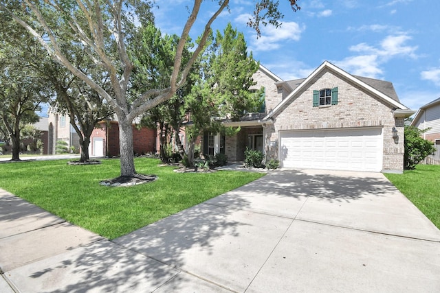 view of front of home with a garage and a front yard