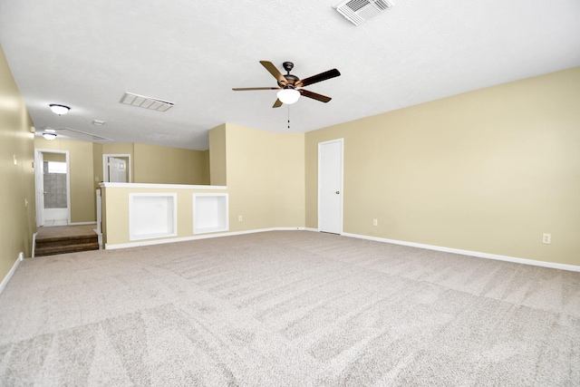 carpeted empty room with ceiling fan