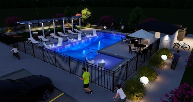 pool at twilight with a patio