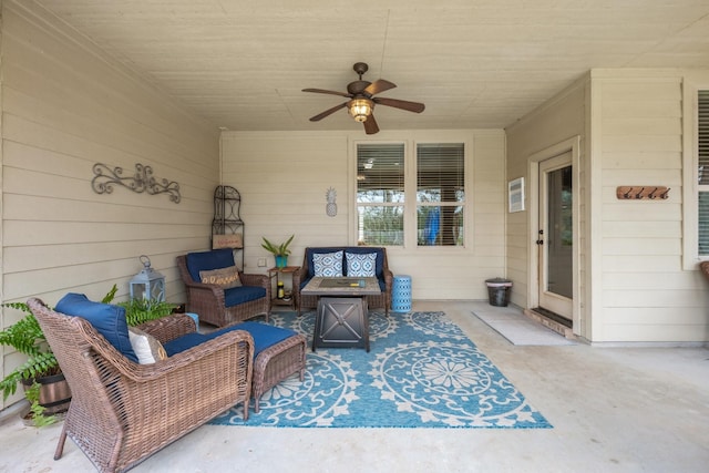 view of patio with outdoor lounge area and ceiling fan