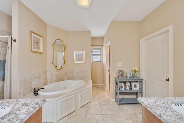 bathroom featuring a bath, walk in shower, vanity, and tile patterned floors