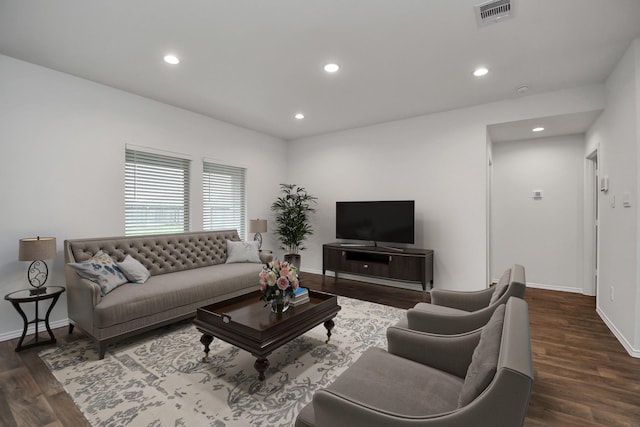 living room with dark hardwood / wood-style floors