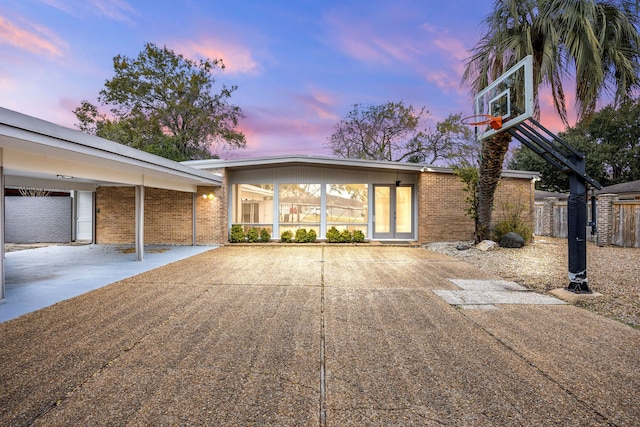 exterior space with basketball court