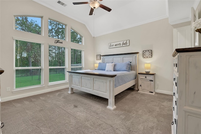 bedroom featuring ceiling fan, light colored carpet, crown molding, and lofted ceiling