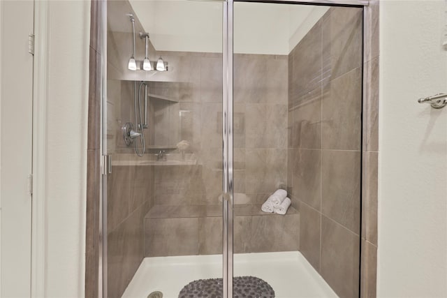 bathroom with an enclosed shower