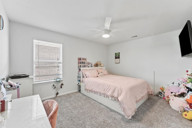 bedroom with ceiling fan and light colored carpet