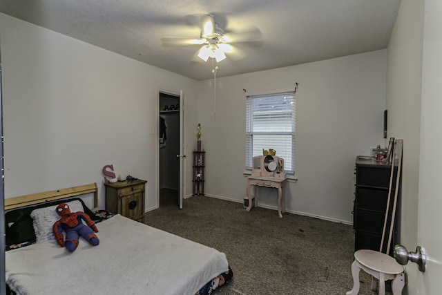 carpeted bedroom featuring a closet and ceiling fan