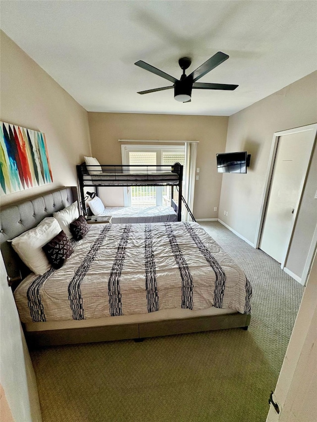 unfurnished bedroom with ceiling fan and carpet flooring