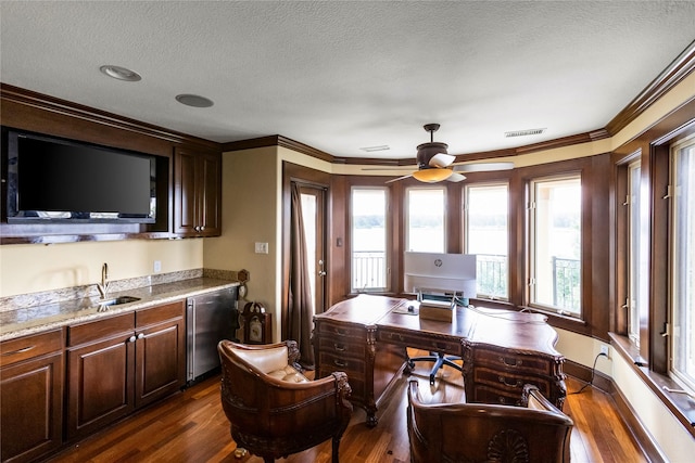 interior space with dishwasher, crown molding, and dark hardwood / wood-style flooring