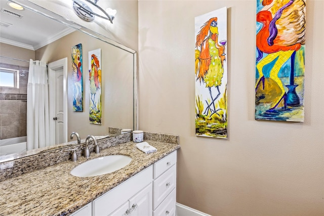 bathroom featuring vanity and ornamental molding