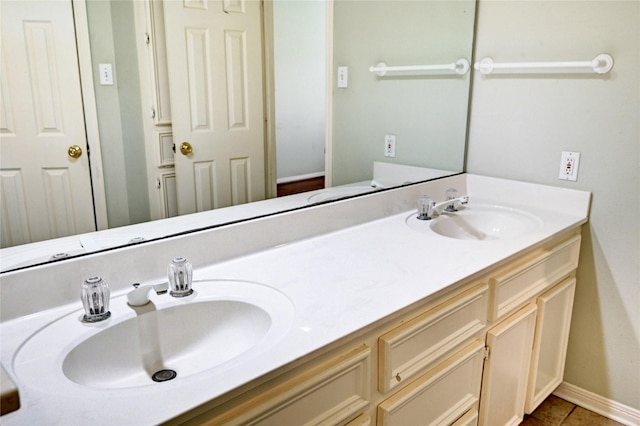 bathroom featuring vanity and tile patterned flooring