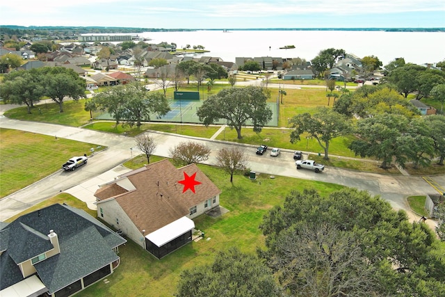 bird's eye view with a water view