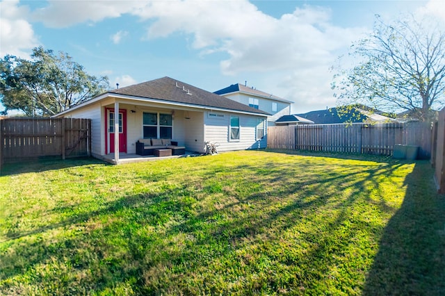 rear view of house featuring an outdoor hangout area, a patio area, and a lawn