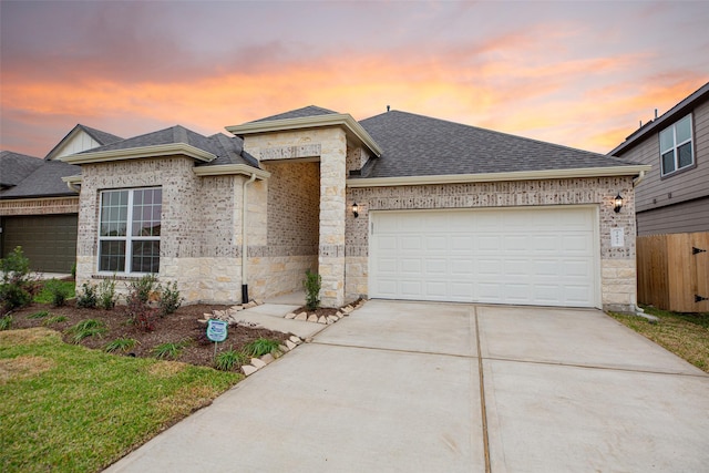 view of front of home with a garage