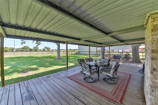 wooden terrace with a yard