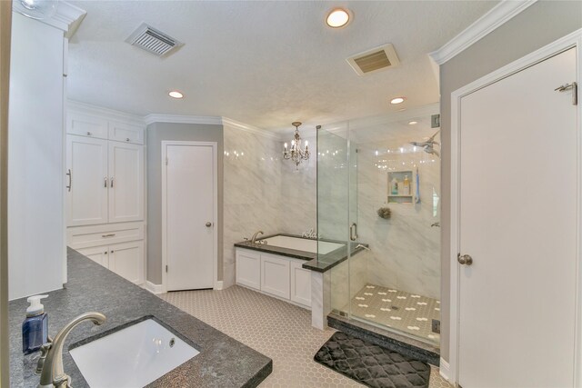 bathroom with ornamental molding, vanity, shower with separate bathtub, and tile patterned floors