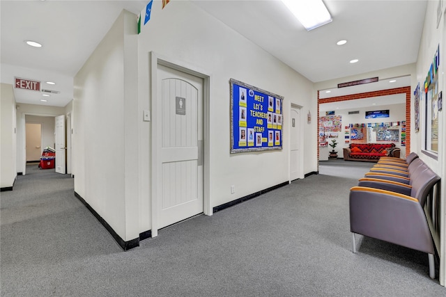 hallway with carpet