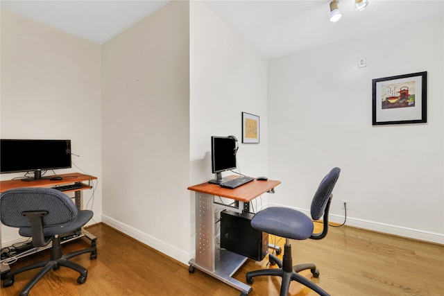 home office featuring hardwood / wood-style floors